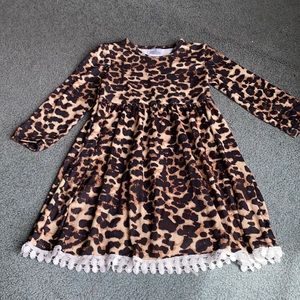 Cheetah dress with lace hem detail